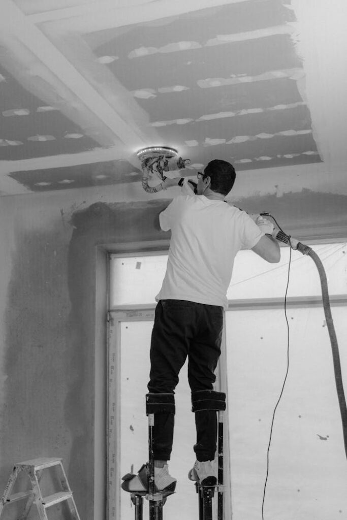 Man Polishing the Ceiling